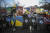  재한 우크라이나인들이 27일 오전 서울 중구 러시아대사관 인근에서 러시아의 우크라이나 침공 규탄 시위를 열고 피켓을 들고 있다. [뉴시스]