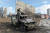  우크라이나군이 파괴된 러시아 전술차량을 살펴보고 있다. AFP=연합