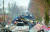우크라이나 수도 키이우 인근 부차 마을에서 도로를 막은 러시아 장갑차량 잔해들. [AP=연합뉴스]