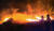 5일 저녁 산불이 확산한 강원 동해시 대진동에서 소방대원이 진화 작업을 하고 있다. [연합뉴스]