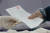 제20대 대통령선거일인 9일 오전 서울 강서구 현대태권도 체육관에 마련된 화곡8동 제5투표소에서 유권자가 투표용지를 받고 있다. 연합뉴스