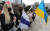 재한 러시아인 등이 12일 오후 서울 종로구 보신각 앞에서 우크라이나 전쟁 반대 집회를 하고 있다. 뉴스1