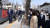 윤석열 대통령 당선인이 16일 오후 서울 종로구 통의동에 위치한 한 식당에서 점심 식사를 마친 후 산책을 하며 시민들에게 인사를 하고 있다. 국회사진기자단