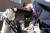 윤석열 대통령 당선인이 16일 오후 서울 종로구 통의동에서 점심식사를 마친 뒤 산책을 하던 중 유모차를 탄 한 아이의 손을 쓰다듬으며 ‘안녕’이라고 말하고 있다. 국회사진기자단