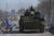 19일(현지시간) 우크라이나에서 장갑차에 탄 러시아 측 병사들. 로이터=연합뉴스 