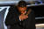 27일(현지 시간) 미국 아카데미 시상식에서 배우 윌 스미스가 폭행 사건이후 남우주연상을 받고 눈물을 흘리고 있다. [AFP=연합뉴스]