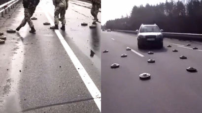  우크라이나 도로에 도배된 지뢰…목숨 걸고 건너는 운전자들 / 31일