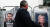 프랑스 차기 대통령 선거에서 재선에 도전하는 에마뉘엘 마크롱(왼쪽) 대통령과 이에 맞서는 마린 르펜 국민연합(RN) 후보의 선거 포스터. [AP=연합뉴스]