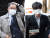 지난해 11월 영장실질심사에 출석한 화천대유 대주주 김만배(왼쪽)씨와 천화동인 4호 소유주 남욱 변호사. 연합뉴스