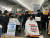  전장연 회원들이 11일 서울 경복궁역에서 장애인 이동권 보장을 요구하며 삭발 시위를 했다. 오유진 기자