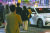 코로나19 방역을 위한 사회적 거리두기가 전면 해제된 지난 18일 서울 강남역 인근에서는 자정을 앞둔 늦은 시간에도 시민들이 빈 택시를 잡기 위해 모여들고 있다. 오랜만에 외부 활동을 즐기는 경우가 늘면서 ‘택시 대란’이 벌어지고 있다. [연합뉴스]