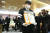고(故) 강수연의 영결식이 열린 11일 오전 서울 강남구 삼성서울병원 장례식장에서 고인의 영정이 식장을 나오고 있다. 뉴스1 