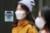 지난달 서울 중구 명동거리의 한 매장에 붙은 마스크 착용 의무화 안내문. 연합뉴스