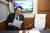 윤석열 대통령이 18일 오전 제42주년 5·18 광주민주화운동 기념식에 참석하기 위해 서울역에서 KTX 특별열차에 탑승, 자료를 검토하고 있다. [사진 대통령실]
