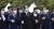 지난 18일 광주 국립 5·18 민주묘지에서 열린 제42주년 5·18민주화운동 기념식에서 윤석열 대통령과 여·야 국회의원, 유족등 참석자들이 함께 손을 맞잡고 '임을 위한 행진곡'을 제창하고 있다. 뉴스1