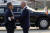 조 바이든 미국 대통령이 20일 미 공군 오산기지에 도착한 뒤 박진 외교부 장관과 인사하고 있다. AP=연합뉴스