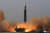 북한이 전날 김정은 국무위원장의 지도 아래 신형 대륙간탄도미사일(ICBM) '화성-17형' 시험발사를 단행했다고 3월 25일 조선중앙통신이 보도했다. 연합뉴스