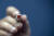 제8회 전국동시지방선거를 하루 앞둔 31일 오후 서울 송파구 신가초등학교 다목적 강당에 설치된 가락본동 제4투표소에서 관계자가 취재진 요청에 기표 도장을 들어 보이고 있다. [연합뉴스]