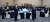 31일 부산세계박람회 유치전략회의에서 윤석열 대통령(앞줄 왼쪽), 최태원 대한상의 회장(앞줄 오른쪽)이 참석자들과 국민의례를 하고 있다. [사진 대한상의]