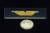  가로 3.6㎝, 세로 1.17㎝ 크기의 통일신라 금박유물 '선각단화쌍조문금박'. 100원짜리 동전과 크기 비교를 하고 있다. 연합뉴스