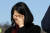 2020년 9월 북한군에 의해 피격된 이대준 씨의 부인이 문재인 정부 당시인 지난 1월 청와대 분수대 앞에서 기자회견을 하다 눈물을 훔치는 모습. 뉴스1.