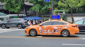 “서울시 실수에 5억원 날릴 판” 택시 ‘갓등 광고’ 논란