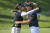 여자 PGA 챔피언십 경기 후 전인지(왼쪽)와 포옹하는 렉시 톰슨. [AP]