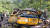 4일(현지시간) 인도 히마찰 프라데시주 쿨루 인근 산길에서 버스가 미끄러져 협곡으로 추락해 뒤집힌 채 찌그러져 있다. [AP=연합뉴스]