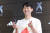 손흥민이 지난 4일 서울 아디다스 홍대 브랜드 센터에서 열린 '손 커밍 데이' 행사에서 손하트를 날리고 있다. [연합뉴스]
