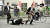 지난 8일(현지시간) 일본 나라현에서 아베 신조 전 총리를 총기로 저격한 남성이 범행 직후 경호원들에게 제압당하고 있다. [로이터=연합뉴스]