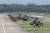 지난 25일 경기도 이천시 육군항공사령부에서 열린 대규모 항공작전 훈련에서 AH-64E 아파치 가디언 공격헬기, UH-60P 블랙호크 기동헬기, CH-47D 시누크 수송헬기가 호버링(제자리 비행)하고 있다. 사진공동취재단