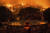 30일 캘리포니아주 클래머스에 있는 한 주택의 울타리 너머로 타오르고 있는 산불 모습. AP=연합뉴스