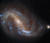지구에서 약 2400만 광년 떨어진 막대나선 은하 NGC 7496. 허블이 가시광선과 근적외선 카메라로 찍은 영상을 합쳐 컬러 이미지로 구현했다. 먼지구름 사이에서 새로운 별들이 탄생하고 있는 모습이 담겨 있어 별의 형성 과정을 연구할 수 있는 귀중한 관측 자료다. 사진 ESA, Hubble, NASA