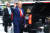 도널드 트럼프 전 미국 대통령이 10일(현지시간) 뉴욕 검찰에 출두하기 위해 차량에 탑승하기 전 사람들에게 인사하고 있다. AP=연합뉴스