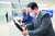 윤석열 대통령과 조 바이든 미국 대통령이 지난 5월 20일 경기 평택 삼성전자 반도체 공장에서 만나 웨이퍼에 서명하고 있다. 뉴스1