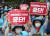 민노총, 한노총, 중앙통일선봉대 조합원들이 지난 13일 서울 용산구 용산미군기지 앞에서 한미연합군사훈련에 반대하는 시위를 벌였다. 뉴시스