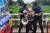 경남 양산경찰서 경찰관들이 지난 16일 문재인 전 대통령 경호실 인사를 커터칼로 협박하는 등 소란을 피운 평산마을 1인 시위자를 체포하고 있다. 사진 평산마을 주민
