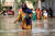 3개월째 폭우가 계속된 파키스탄의 남부 신드주의 침수지에서 27일 주민들이 무릎까지 오는 물을 헤치며 걷고 있다. [EPA=연합뉴스]