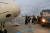IAEA 지원단이 29일(현지시간) 우크라이나 자포리자 원전 사찰을 위해 오스트리아 빈 공항에서 비행기에 탑승하는 모습. AFP=연합뉴스