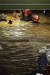 6일 저녁 태풍 '힌남노'의 폭우로 잠긴 경북 포항시 남구의 한 아파트 지하 주차장에서 실종된 주민이 소방관계자들의 도움을 받아 물이 가득 찬 지하주차장 입구를 빠져나오고 있다. 매일신문 제공