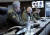 블라디미르 푸틴 러시아 대통령(가운데)이 6일 세르게이 쇼이구 국방부 장관(왼쪽), 발레리 게라시모프 군 총참모장(오른쪽)과 ‘보스토크 2022 전략 지휘소 연습 ’을 참관하고 있다. [EPA=연합뉴스]