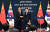 김진표 국회의장(오른쪽)과 리잔수 중국 전인대 상무위원장이 국회에서 회담을 마친뒤 악수하고 있다. 뉴스1