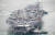 한·미 해상 연합훈련 첫날인 지난 26일 부산 남구 해군작전기지에서 미국 해군의 핵추진 항공모함 로널드 레이건함(CVN-76)이 동해로 출항하고 있다. 뉴스1