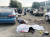 30일 우크라이나 자포리자로 향하던 민간인 차량 행렬이 미사일 공격을 받아, 시신들이 차량 옆에 누워 있다. 로이터=연합뉴스