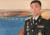 26년간 대북공작관으로 맹활약한 정규필 예비역 대령이 평양 시내 전경 그림 앞에 서 있다. 장세정 기자 