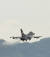 북한이 중거리 탄도미사일(IRBM)을 발사한 4일 경기도 평택시 주한미공군 오산기지에서 F-16 전투기가 이륙하고 있다. 연합