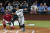 뉴욕 양키스 애런 저지(오른쪽)가 5일 텍사스전에서 시즌 62호 홈런을 쏘아 올리고 있다. 아메리칸리그 최다 홈런 신기록이다. [AP=연합뉴스]