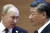 지난달 16일 우즈베키스탄에서 열린 상하이협력기구(SCO) 정상회담에서 환담하는 푸틴(왼쪽) 대통령과 시진핑 국가주석. AP=연합뉴스