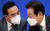 이재명 민주당 대표(오른쪽)와 박홍근 원내대표가 18일 국회 당대표 회의실에서 열린 납품단가연동제 촉구 중소기업인과의 간담회 도중 대화를 하고 있다. 장진영 기자