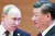 지난 9월 16일 우즈베키스탄 사마르칸드에서 열린 상하이협력기구(SCO) 정상회담에서 블라디미르 푸틴(왼쪽) 러시아 대통령이 시진핑 중국 국가주석에게 말을 건네고 있다. [AP=연합뉴스]